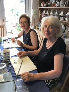 Making necklaces at craft group