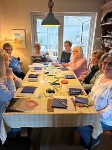 Ladies working on their parchment craft