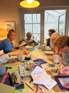 Ladies working on their parchment craft